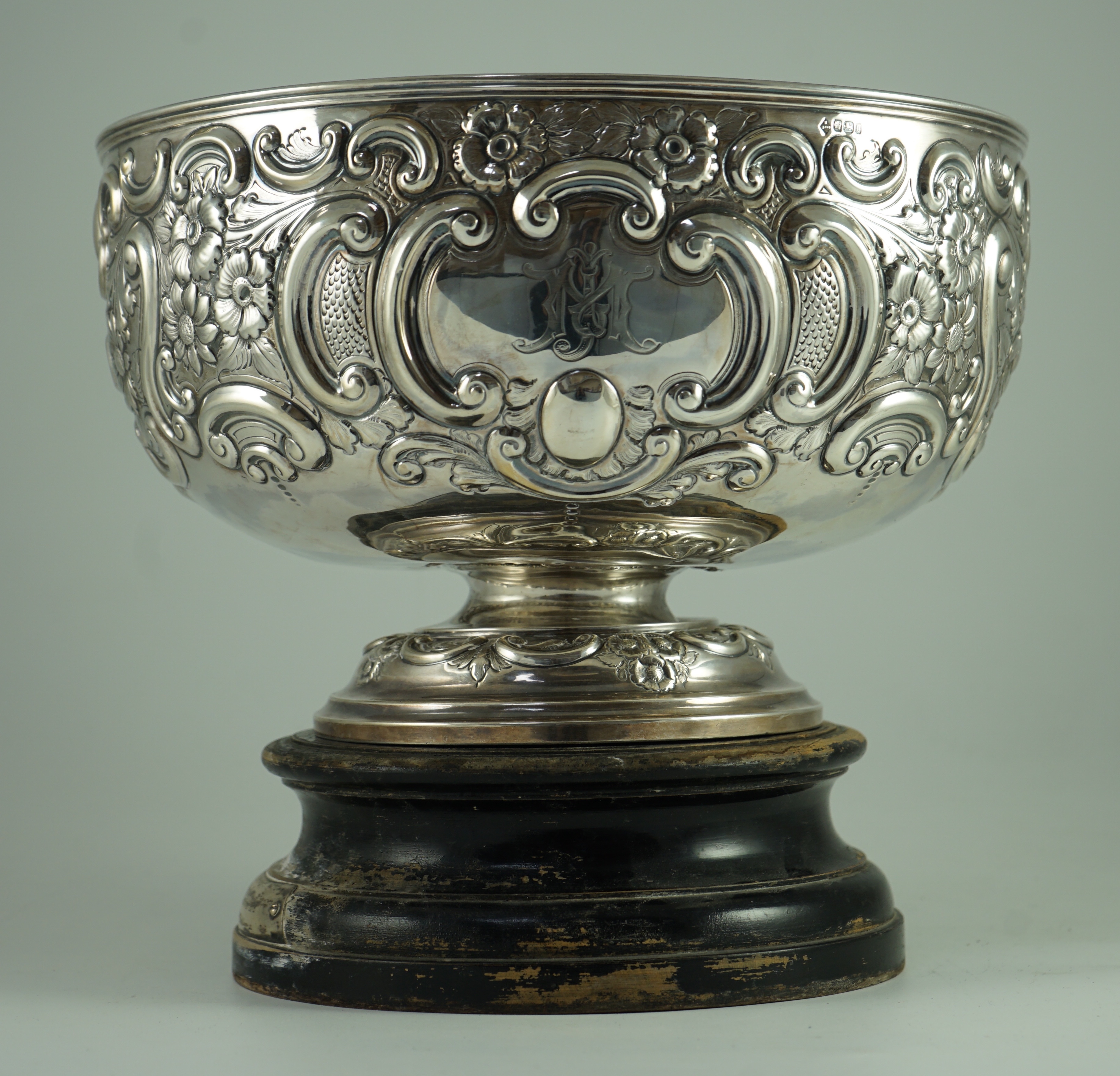 A late Victorian embossed silver pedestal punch bowl by Mappin Brothers (a.f.)